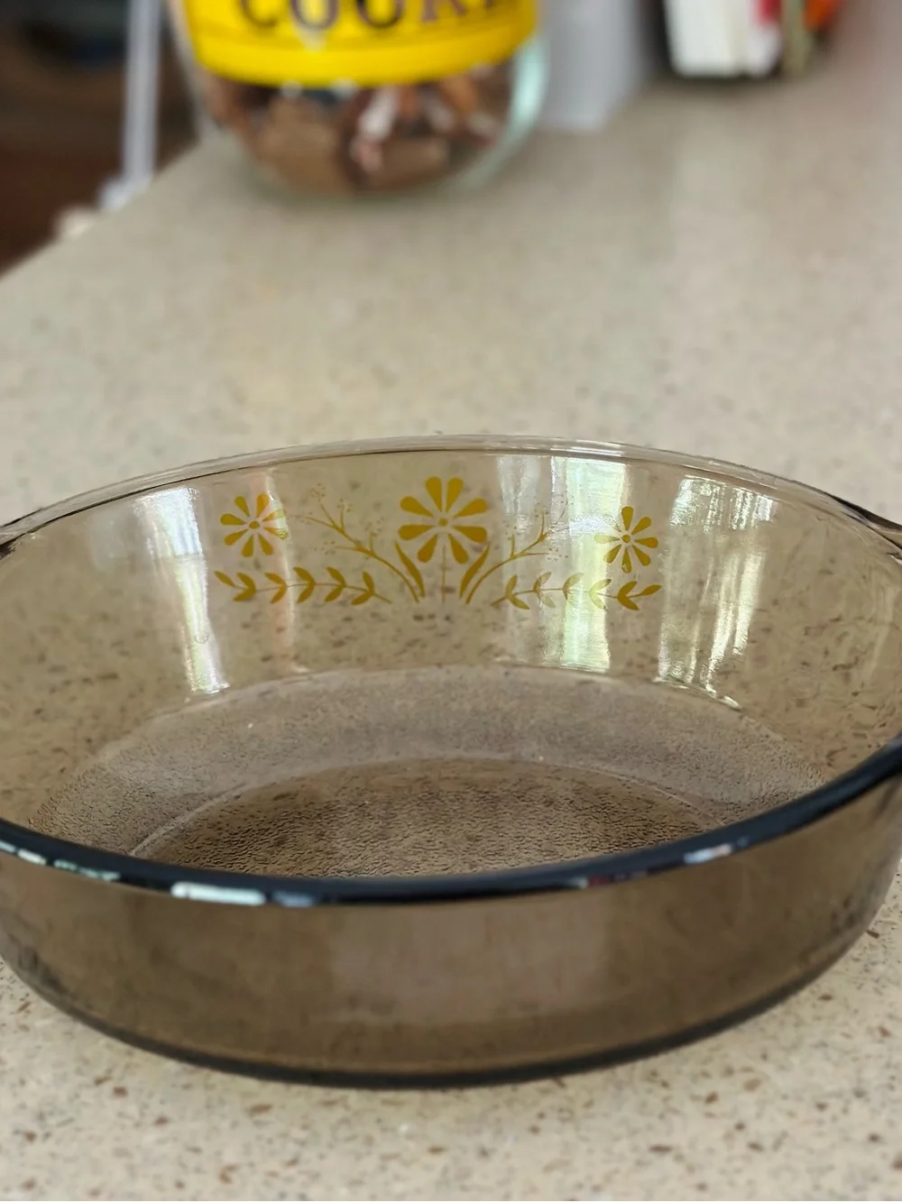 Vintage yellow daisy and smoked amber casserole dish